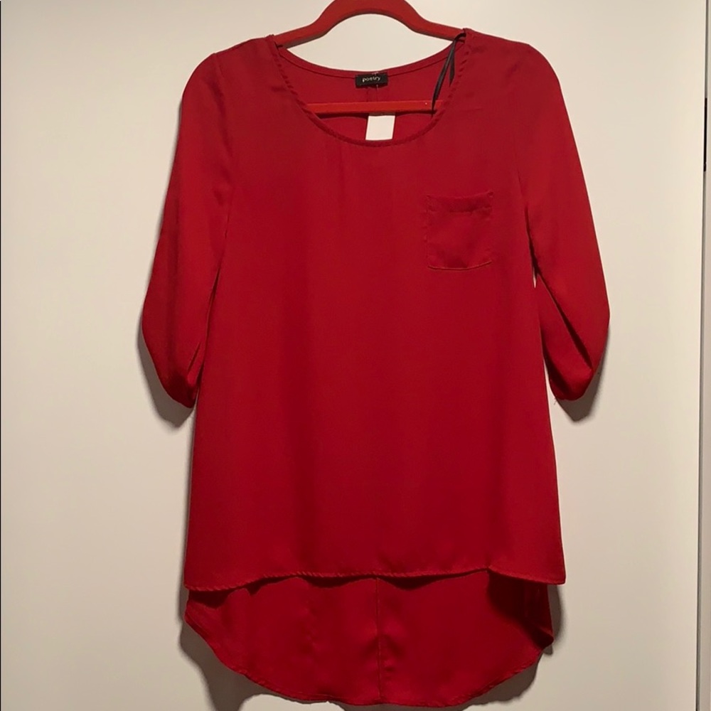 Brand new red blouse.